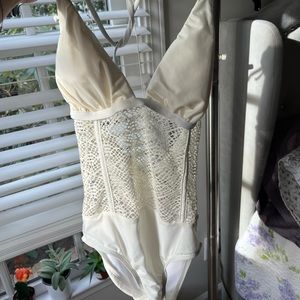 White sexy one piece bathing suit, or body suit